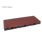 base racine sculptée bois rouge foncé sculptures complexes classique simple élégant