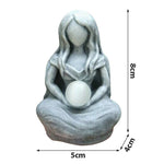 statue méditation femme sphère gris blanche pierreuse sculptée spirituelle intérieure décoration maison