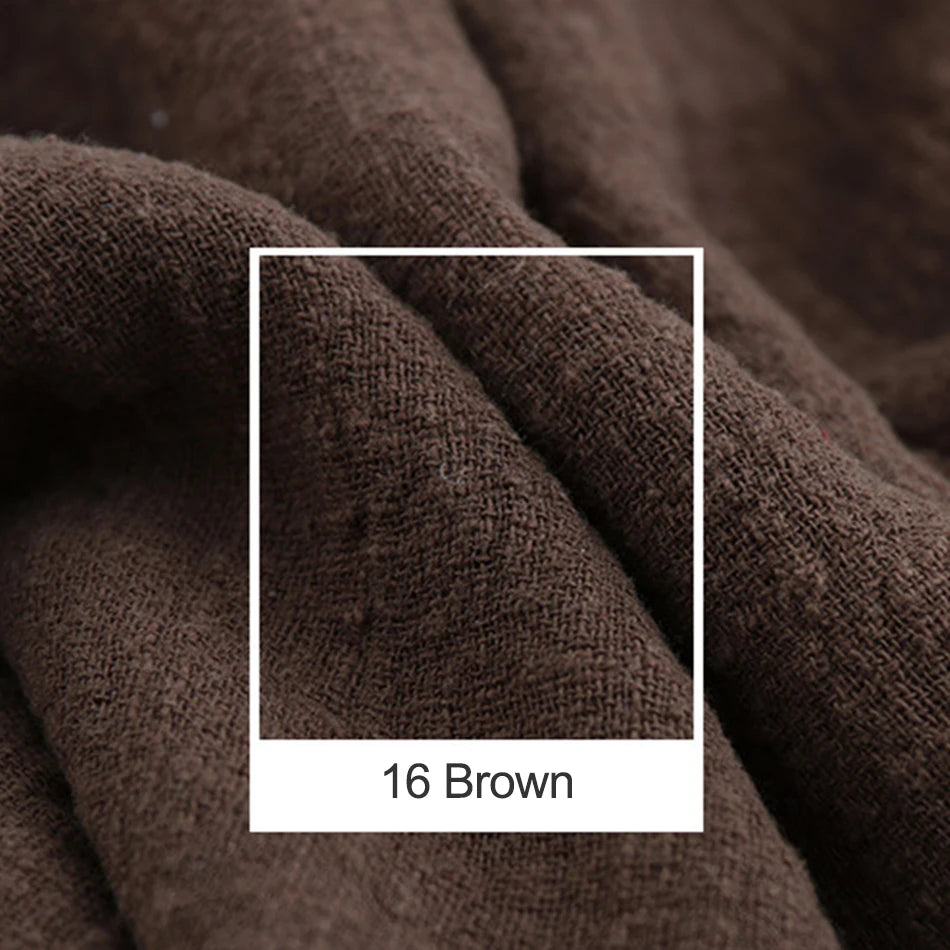 L'image montre un gros plan d'un tissu marron texturé, avec un encadré blanc indiquant la couleur "16 Brown".