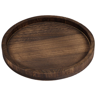 Plateau rond en bois 30 cm design vintage sur table en bois