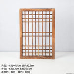 grille fenêtre traditionnelle marron foncé décoration murale classique règles horizontales verticales opacité décoration courtyard