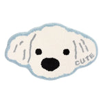 Tapis en forme de mignon petit chien blanc avec de grands yeux noirs, représenté de manière simplifiée avec du texte "clute".