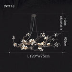 suspension luminaire branches cuivre fleurs artificielles moderne noir blanc salon salle manger intérieur