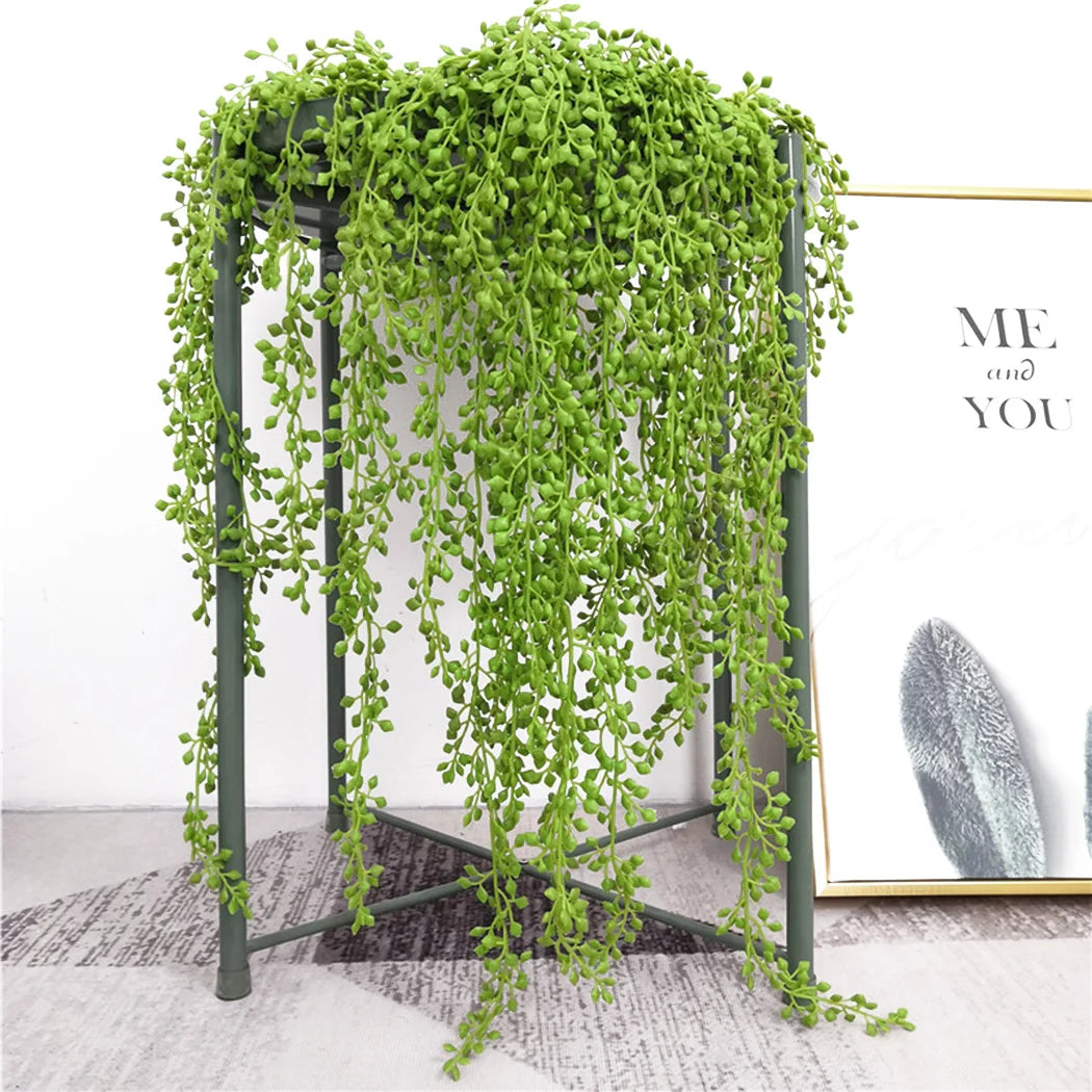 plante artificielle feuilles vertes branches mur extérieur décoration jardin botanique accrochée tige fine verte