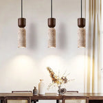 Lampes suspendues moderne minimaliste pierre texture granuleuse lumière chaude chambre salon restaurant étude