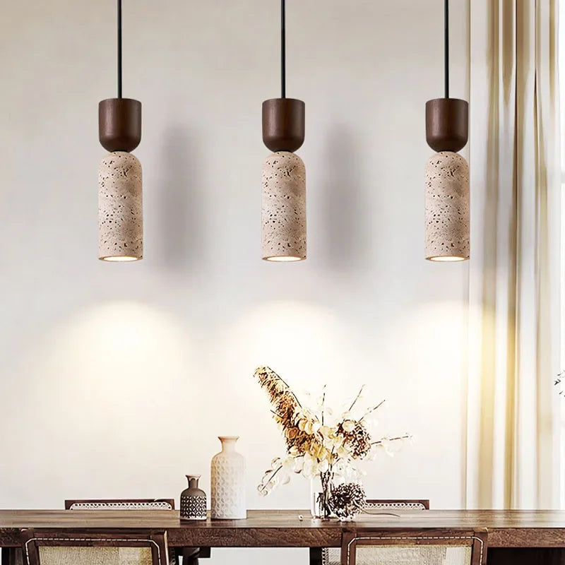 Lampes suspendues moderne minimaliste pierre texture granuleuse lumière chaude chambre salon restaurant étude