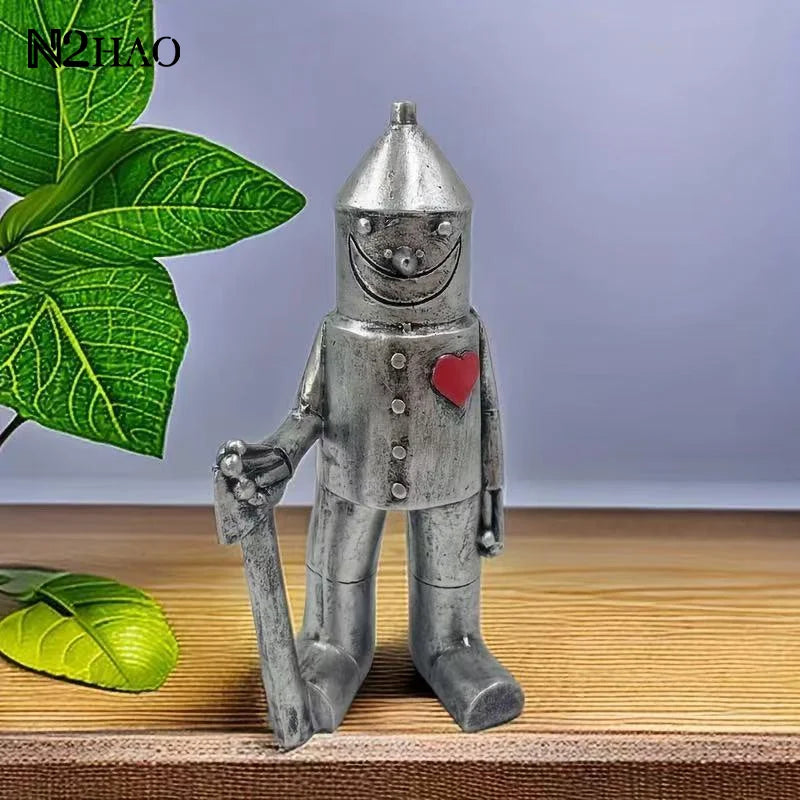 statue jardin résine robot argenté texture vintage souriant hache coeurs éléments