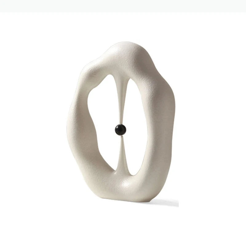 sculpture abstraite contemporaine blanc gris minimaliste texture mat forme organique noire central