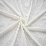 tissu polyester élastique fleurs blanches texture classique 150cm large 240g/m