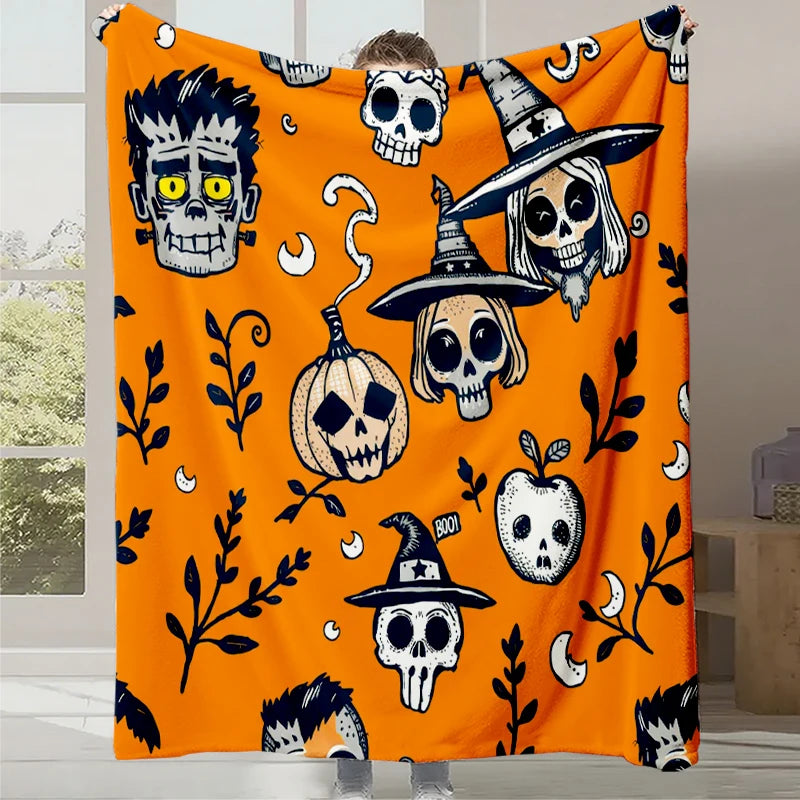 Couverture festive avec des motifs de crânes, de citrouilles et de personnages effrayants sur un fond orange vif, créant une ambiance d'Halloween typique.