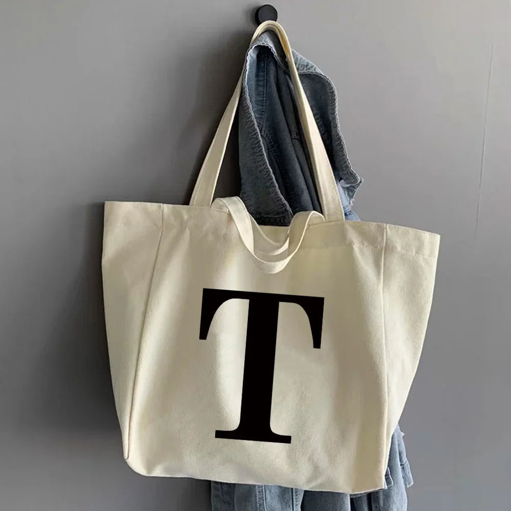 sac main femme toile beige clair lettre noire poignées détachables