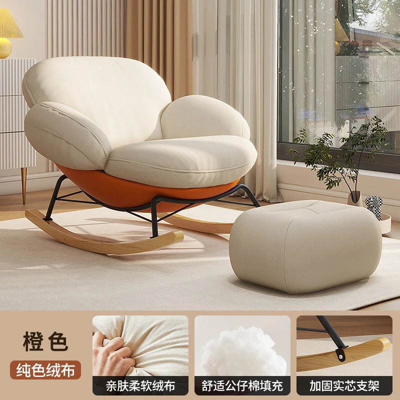 fauteuil bascule moderne beige noir orange roulettes coussin repos minimaliste salon