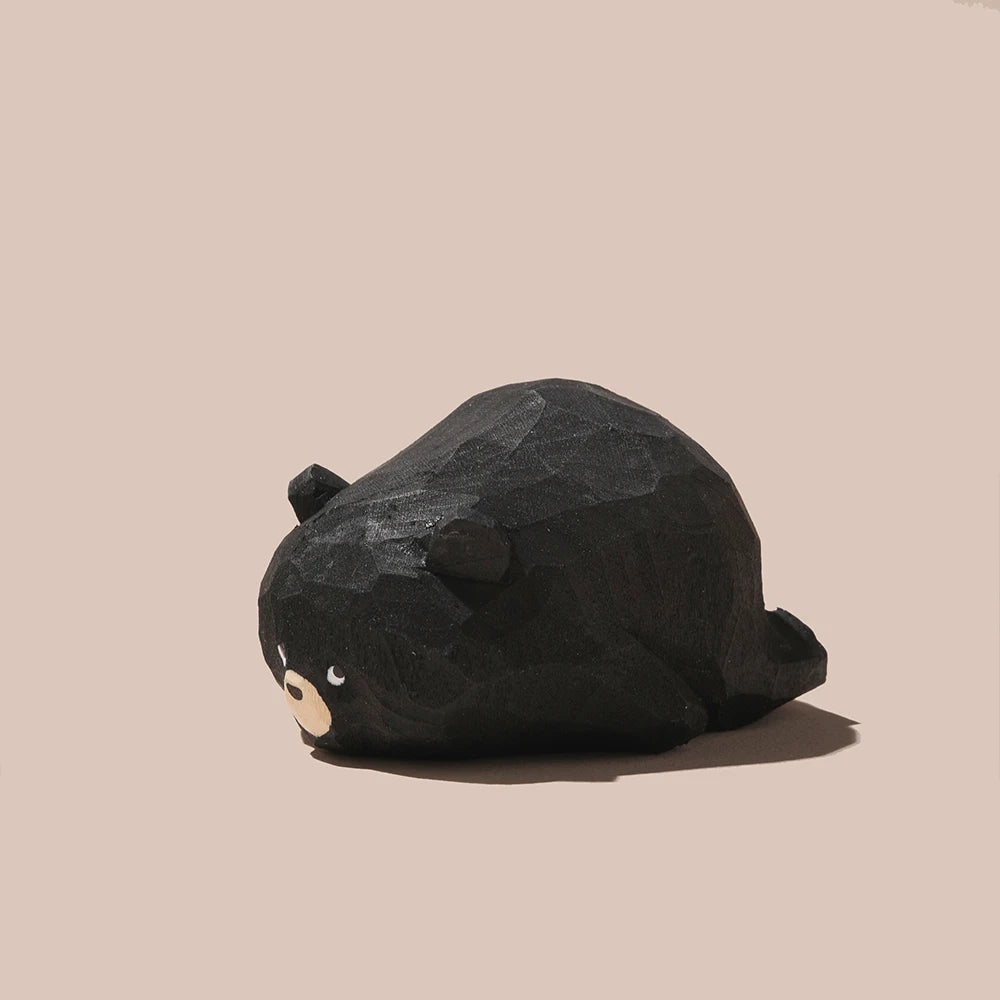 figurines animaux bois marron clair blanc noir facettes géométriques minimaliste modernes