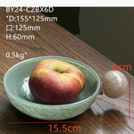 ensemble vaisselle céramique vert clair tasses bol carafe couvercle plateau fruits bougie fleur artificielle