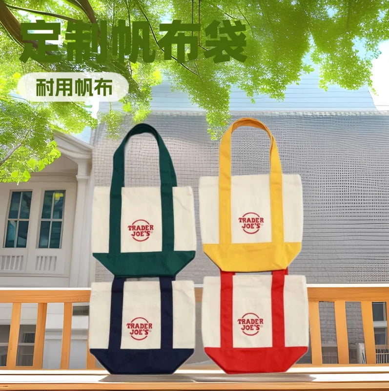 sac main toile verte rouge blanc jaune trader joes logo poignées simple pratique