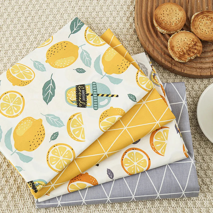 tissu coton imprimé citrons jaune gris moderne patchwork couture bricolage serviettes graphique ecofriendly