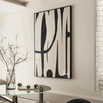 Tableau mural moderne accroché dans un salon avec décoration contemporaine