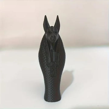 statue égyptienne anubis noir or texture quadrillée décoration salon chambre coucher