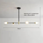 suspension lumineuse moderne minimaliste noir doré blanc sphères translucides métal poli
