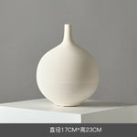 vases céramique blancs rayures horizontales modernes fleurs artificielles