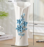 vase porcelaine céramique fleurs relief blanc classique moderne décoration table