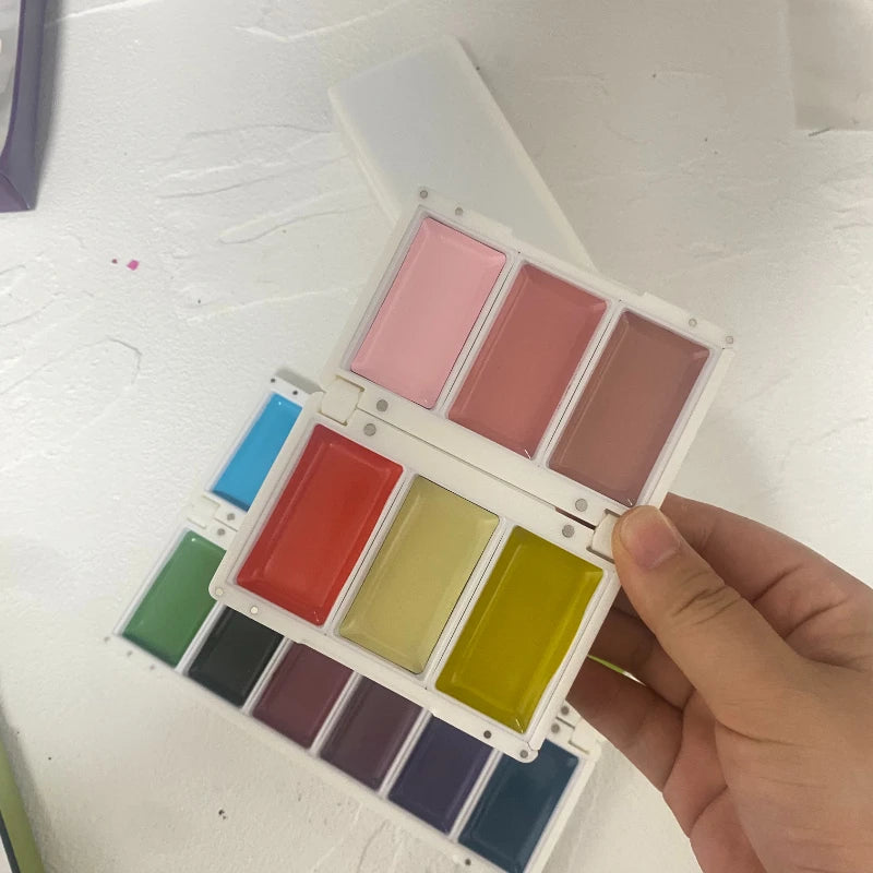 palette pliante peinture aquarelle portable plastique diverses couleurs artistique creatif translucide charnières