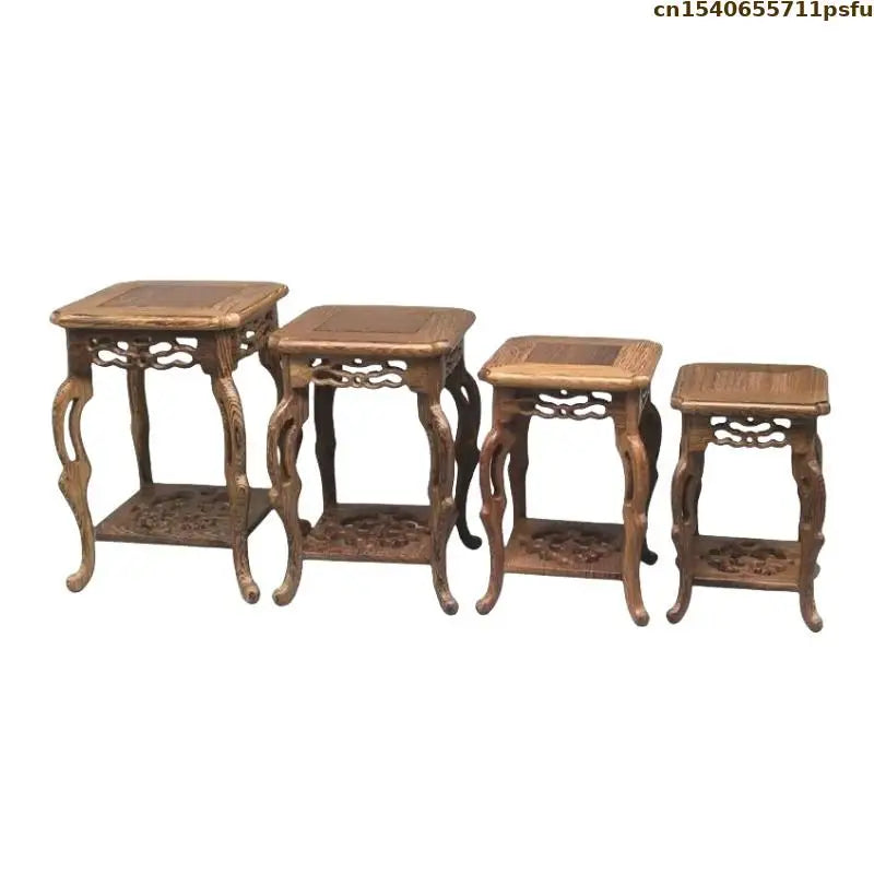 table basse bois rose classique gravures artisanal marron clair pot plante figurine cadre photo