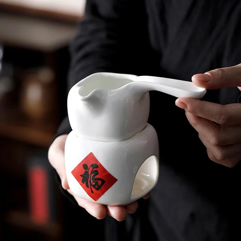 diffuseur huiles essentielles céramique blanc motif calligraphie chinoise rouge salon minimaliste
