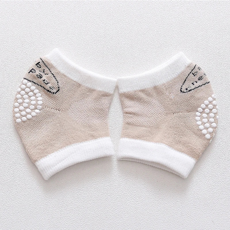 protège genoux bébé jaune orange bleu gris rose animaux oiseau tigre blanches sécurité enfants