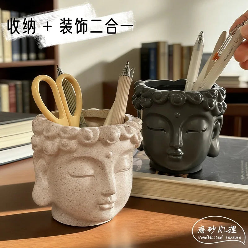 pot crayons tête bouddha beige clair texture sculptée moderne décoratif bureaustylos ciseaux