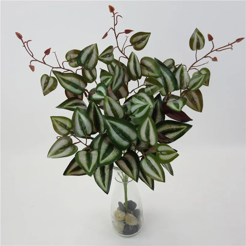 plantes artificielles violet vert marron feuilles ovales moderne décoration extérieure vase galets noirs blancs