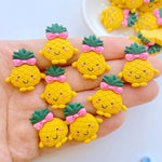 décorations maison biscuits jaune vert rose fruits yeux sourire ruban ananas artisanat scrapbook bricolage