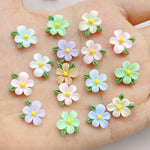 bijoux décoration ongles nail art fleurs colorées résine minimalistes blanc rose bleu vert jaune