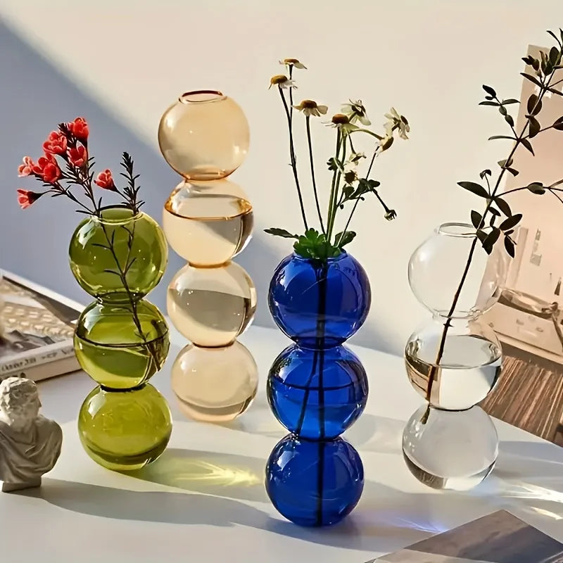 vases transparents modernes sphères empilées bleu vert marron beige