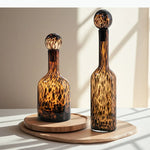 vase moderne bouteille marron léopard boule décorative support bois
