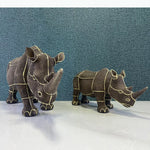 statuette rhinocéros marron foncé texture granuleuse décoratif animalier doré grande petite