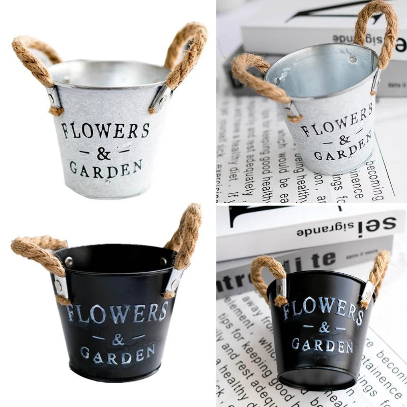 pots fleurs métal gris argenté noir texte imprimé rustique vintage fleurs plantes terre