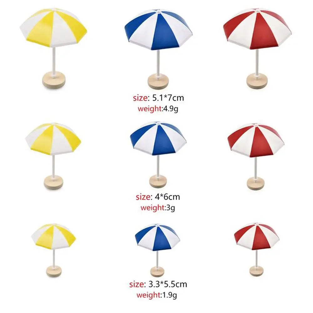 parasols miniatures décorations paysage moderne rouge blanc bleu jaune rayures horizontales tringle base circulaire