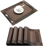 tapis table moderne rayures horizontales beige marron gris clair assiette cuillère couteau tasse