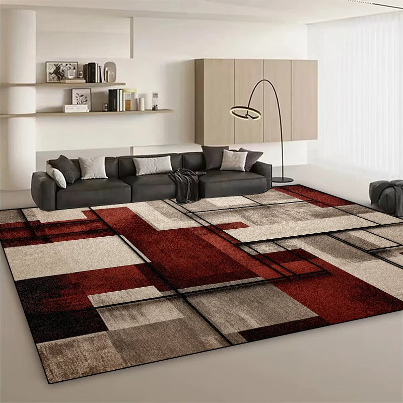Tapis moderne au design géométrique avec des touches de rouge, de gris et de noir, créant une atmosphère élégante et épurée dans ce salon.