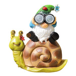 décoration jardin gnome limace résine éclairage solaire vert bleu marron fleurs coccinelle lunettes