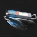 lampe torche rechargeable lumiere intense gris orange moderne anneau fixation interrupteur led