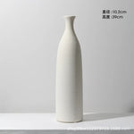 vases céramique blancs rayures horizontales modernes fleurs artificielles