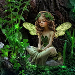statue fée jardin vert clair trèfle ailes veinées fantaisie natureextérieurintérieurDecorationJardinFéeSculptee