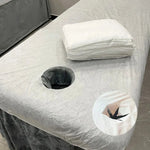 couverture table massage blanche tissu lisse hexagonal hygiène professionnel pliée relaxation salon beauté