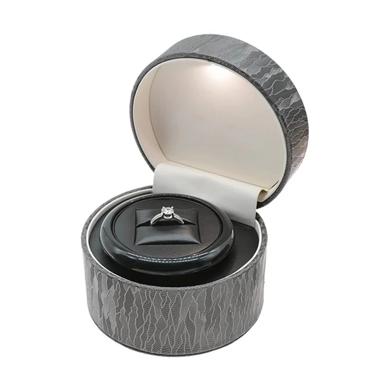 boîte bijoux rotation led noir gris cuir classique anneau rangement présentation mariage professionnel