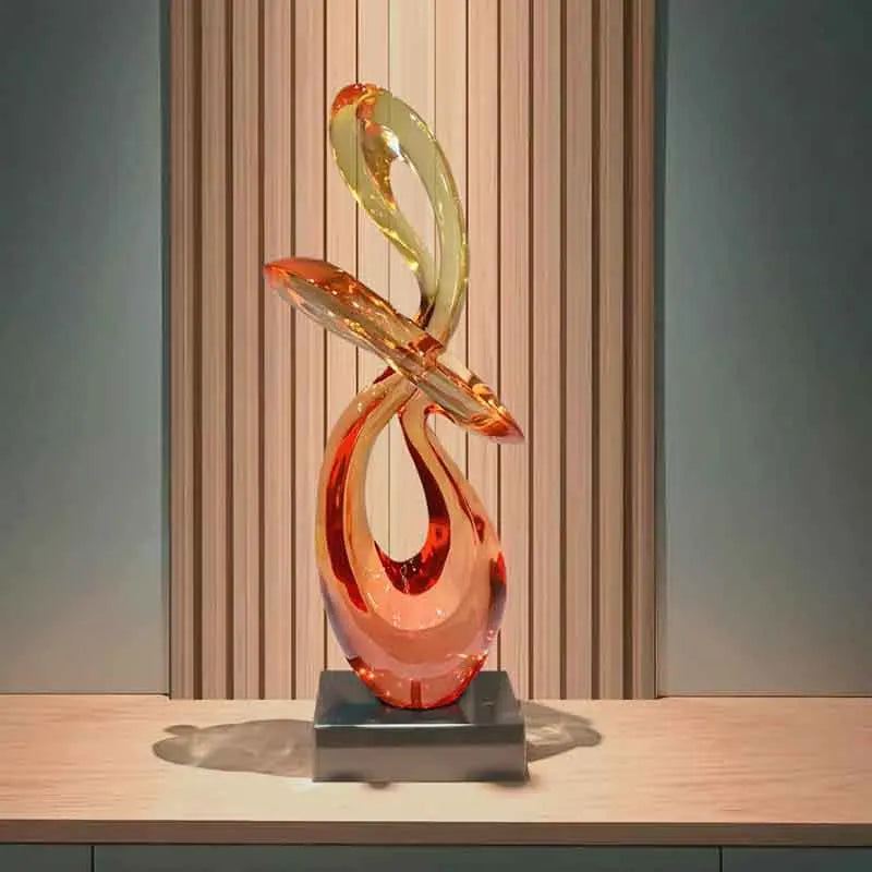 décoration abstraite moderne résine transparente sculpture verre orange jaune socle noir