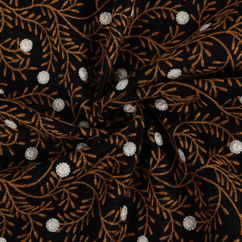 tissu brodé motifs floraux noir marron doré blanc respectueux environnement traditionnel 125cm large