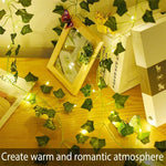 guirlande lumineuse artificielle feuilles vertes lumières led blanc decoration intérieure extérieure noël moderne