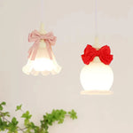 Lampe suspendue noeud papillon rose verre laiteux chambre fille